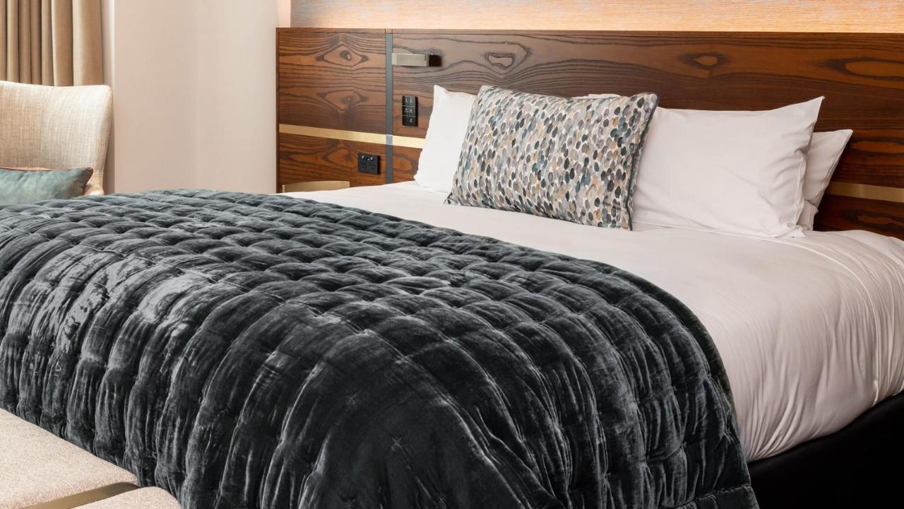 Horizon By Skycity Auckland Bagian luar foto A bed with a throw